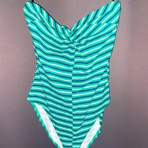 A green striped onesie from Forever 21. Size Small. Great condition. Worn twice.